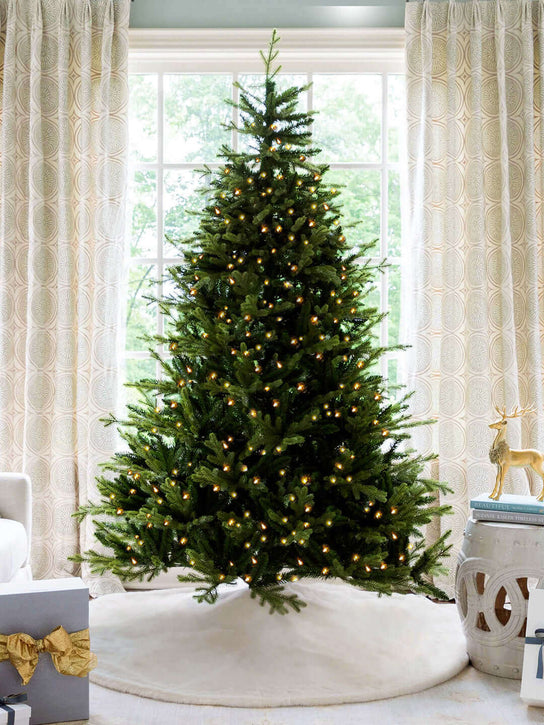 The beautifully realistic premium 9' Scarlet Fir Pre-Lit Artificial Christmas Tree with lights and tree stand