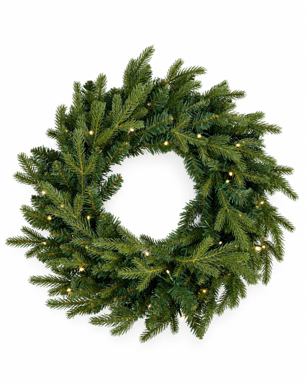 28 in Alpine Fir artificial Christmas wreath, glowing with warm white LED lights, above a mantel garland with gold reindeer