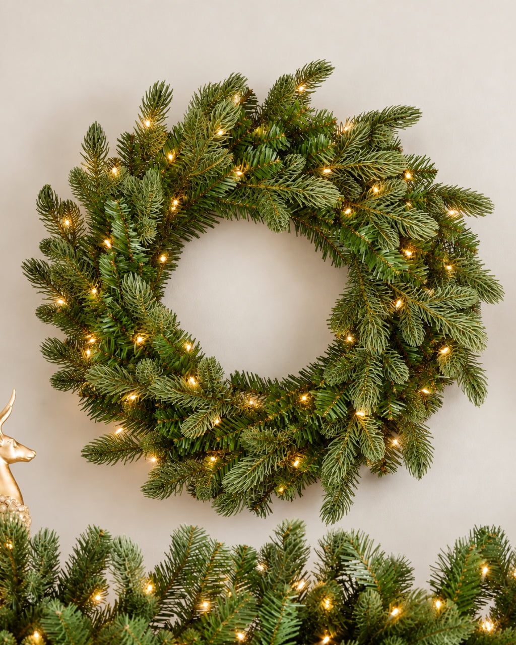 28 in Cypress Spruce artificial Christmas wreath, glowing with warm white LED lights