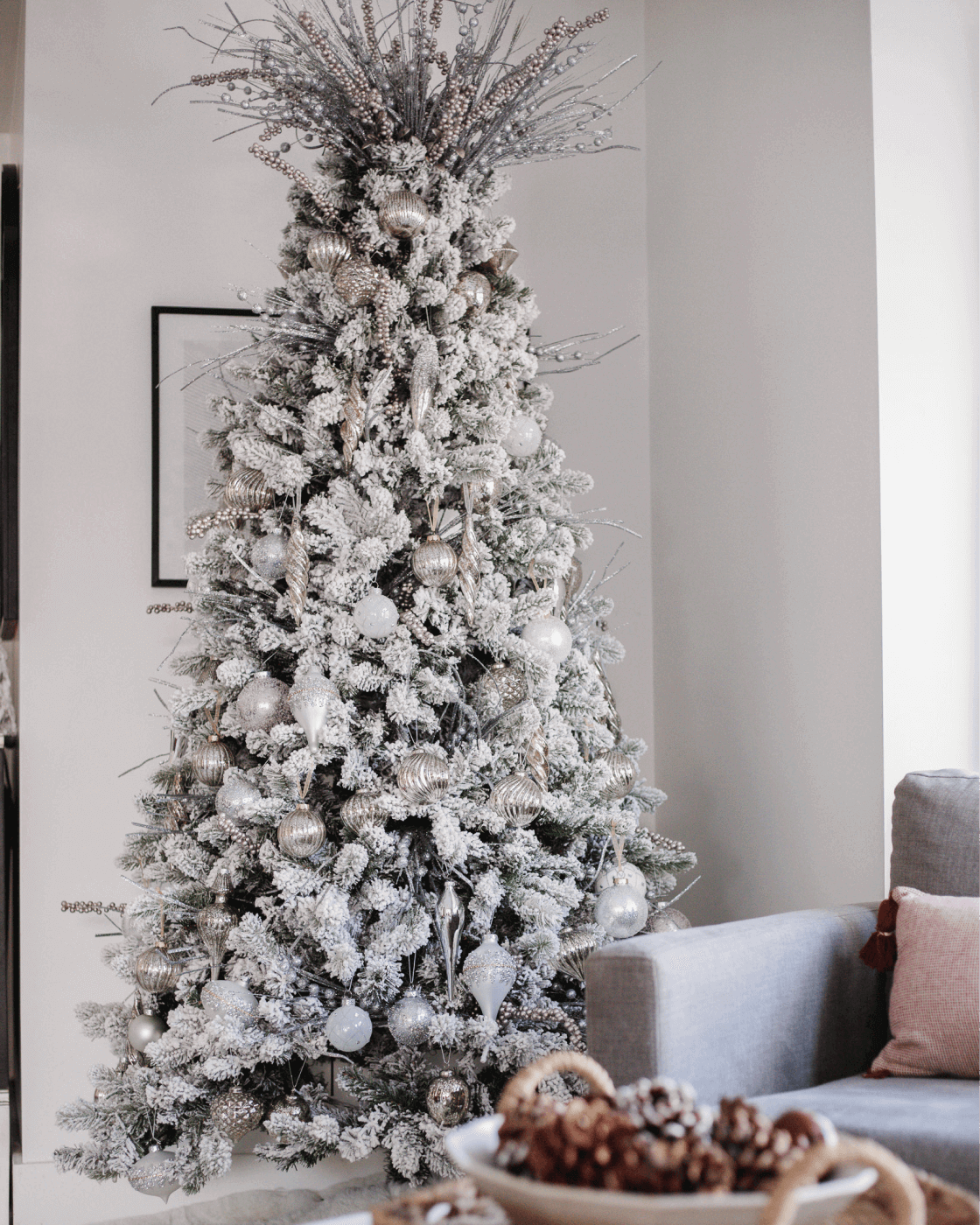 silver dress christmas tree A Beautiful Girl in Elegant Silver Dress is Standing Near the Christmas Tree  Stock Photo