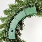 28 in King Noble Fir artificial Christmas wreath, close-up of the battery pack on the back