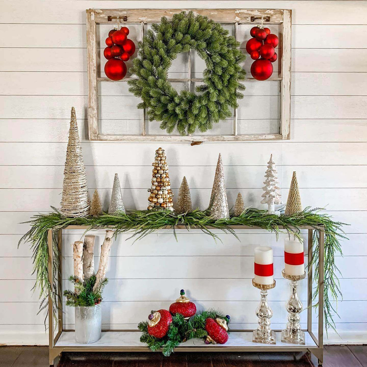24 in Royal Fir artificial Christmas wreath, unlit, with red ornaments above a console table