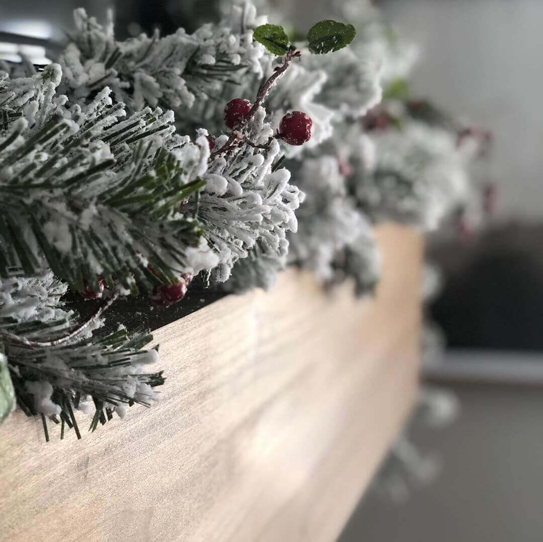 King of Christmas 9' x 12" King Flock® Garland with LED Lights (Battery Operated)