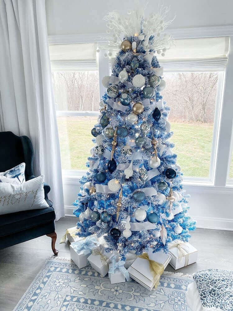 King of Christmas 7.5' Duchess Blue Flock Artificial Christmas Tree with 600 Warm White LED Lights