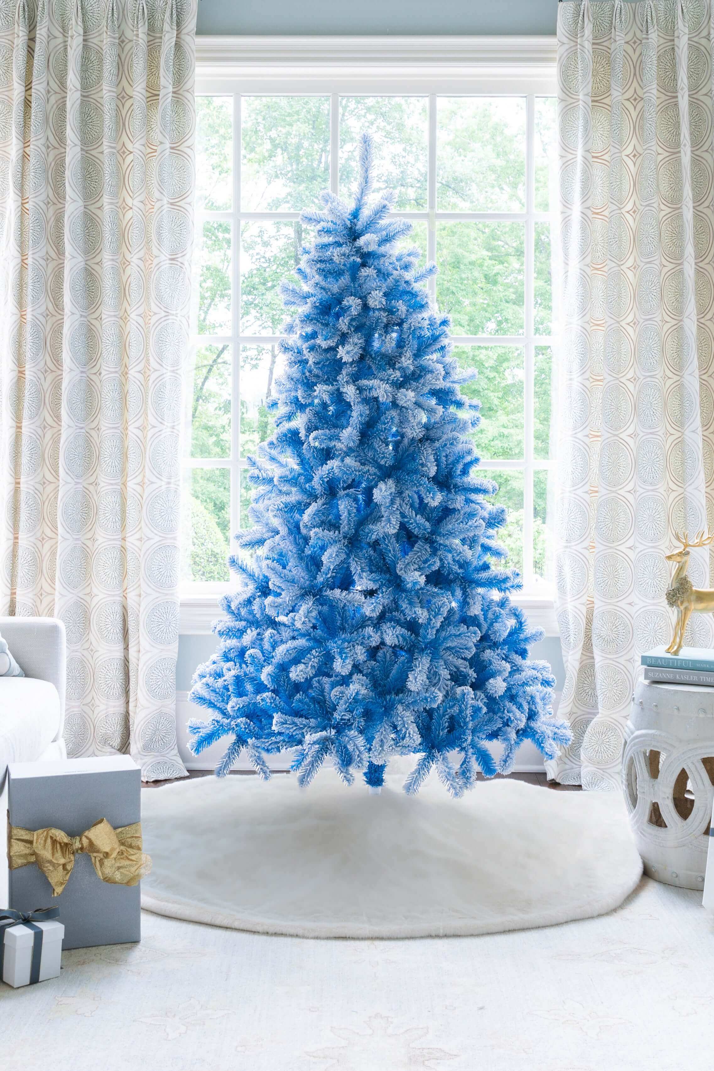 King of Christmas 7.5' Duchess Blue Flock Artificial Christmas Tree with 600 Warm White LED Lights