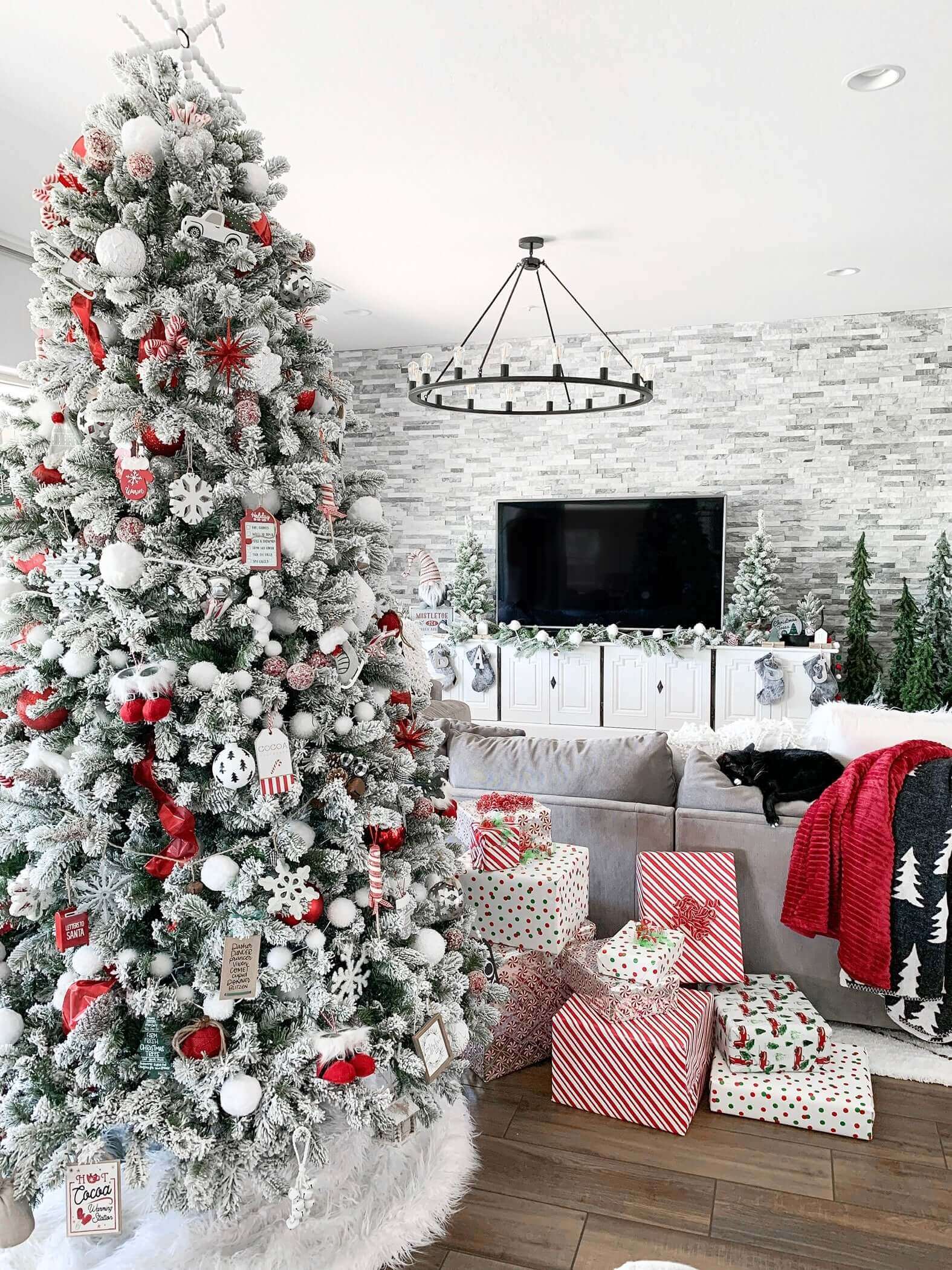 King of Christmas 9' King Flock® Artificial Christmas Tree with 1100 Warm White LED Lights