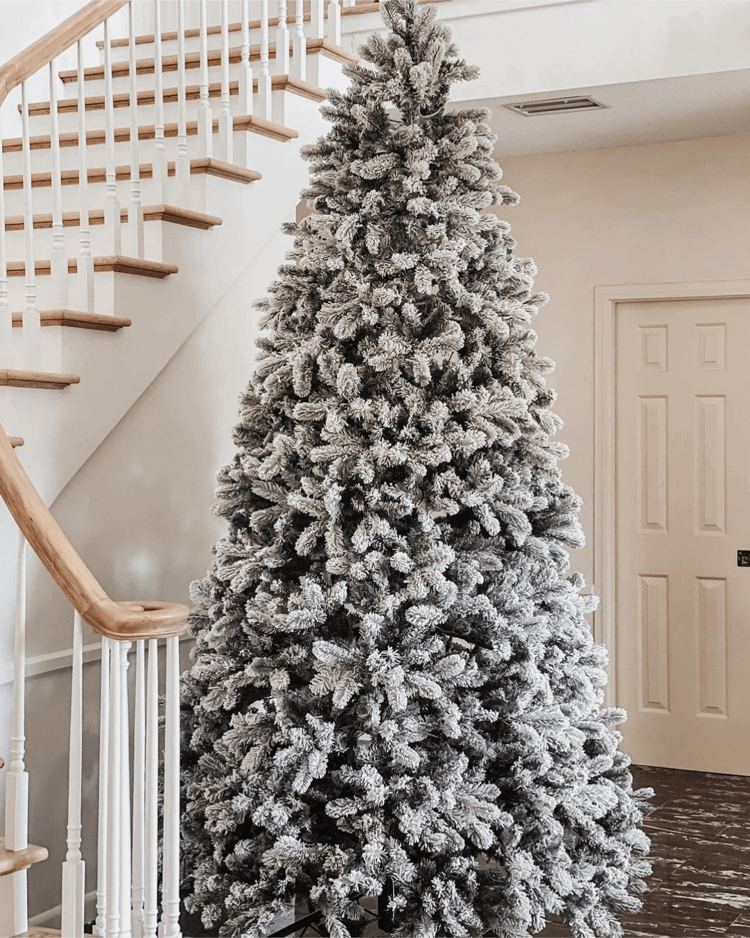 King of Christmas 10' King Flock® Artificial Christmas Tree with 1250 Warm White LED Lights