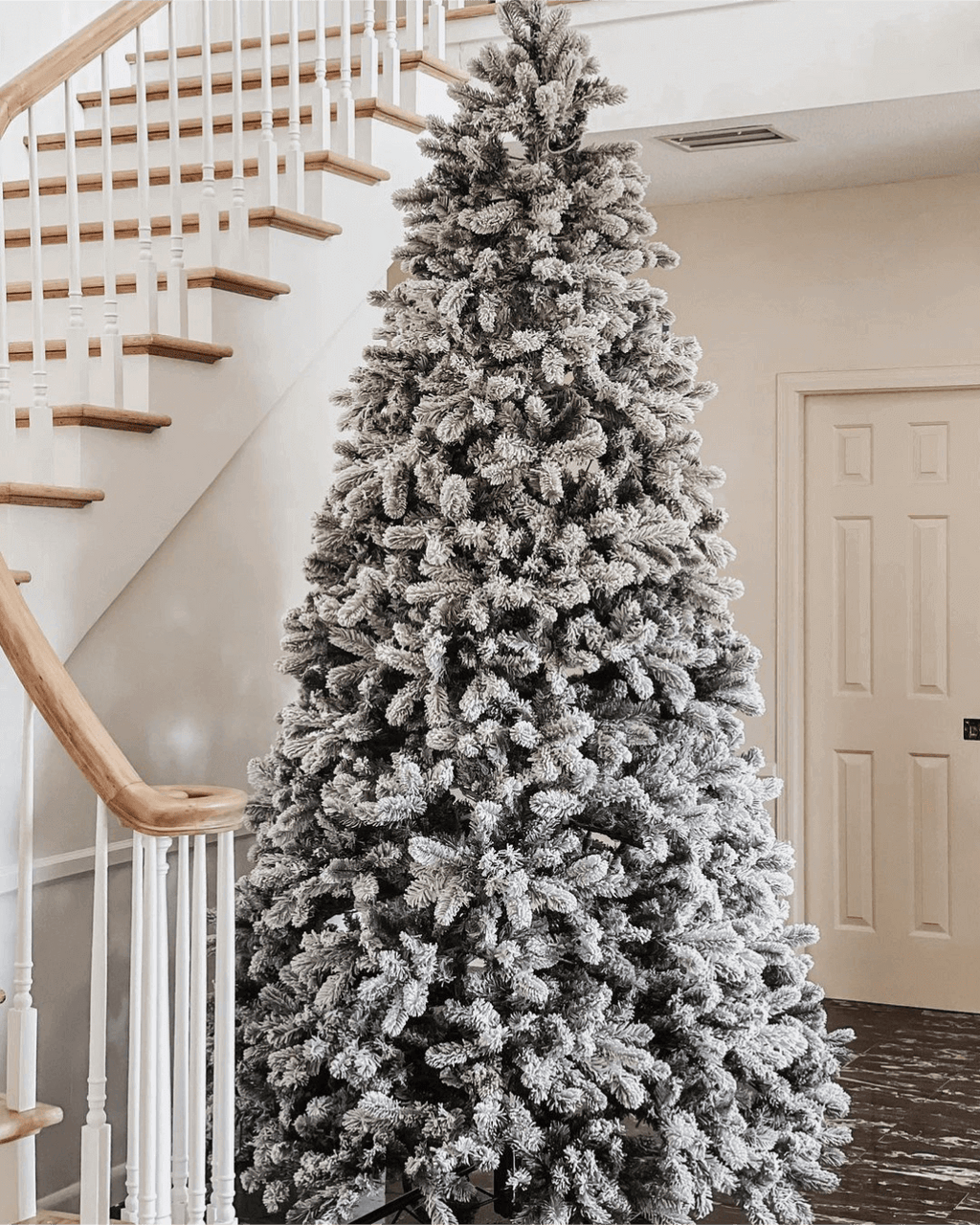 King of Christmas 9' King Flock® Artificial Christmas Tree with 1100 Warm White LED Lights