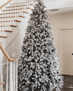 King of Christmas 9' King Flock® Artificial Christmas Tree with 1100 Warm White LED Lights