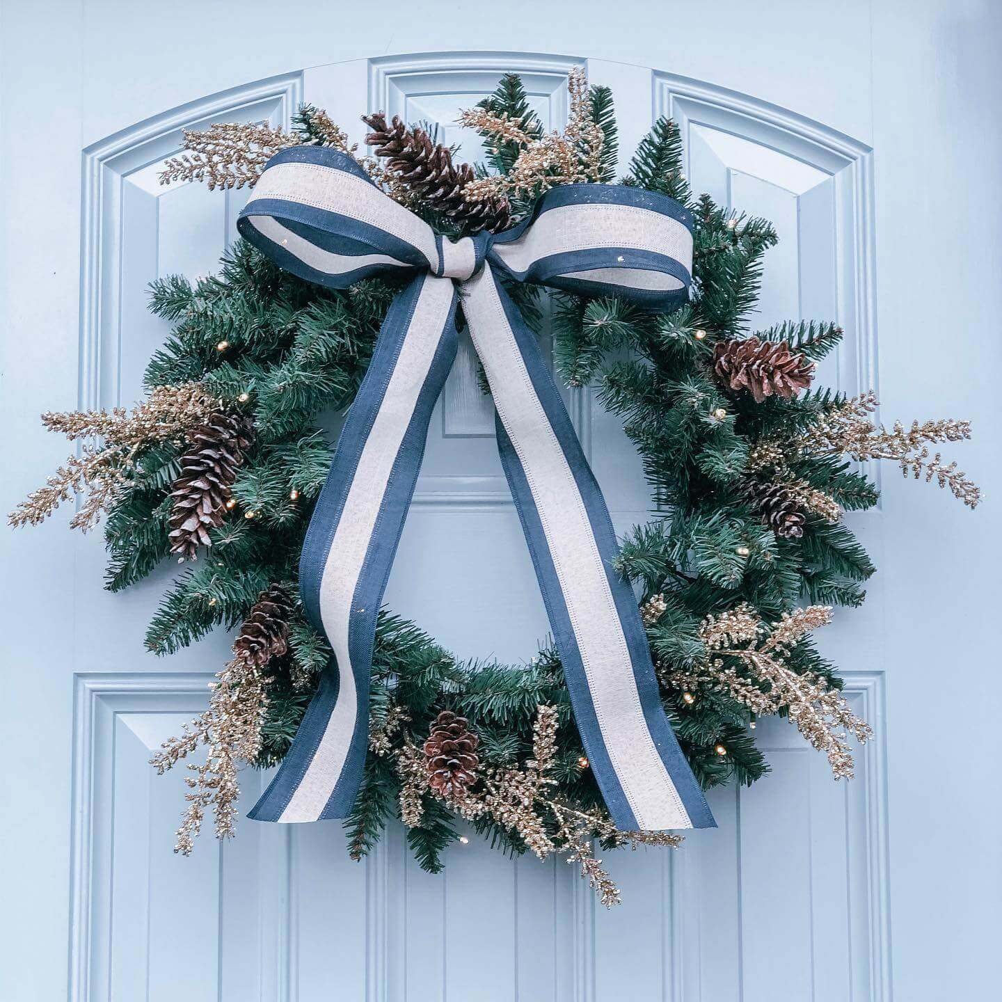 King of Christmas 24" Tribeca Spruce Blue Wreath with Warm White LED Lights (Battery Operated)