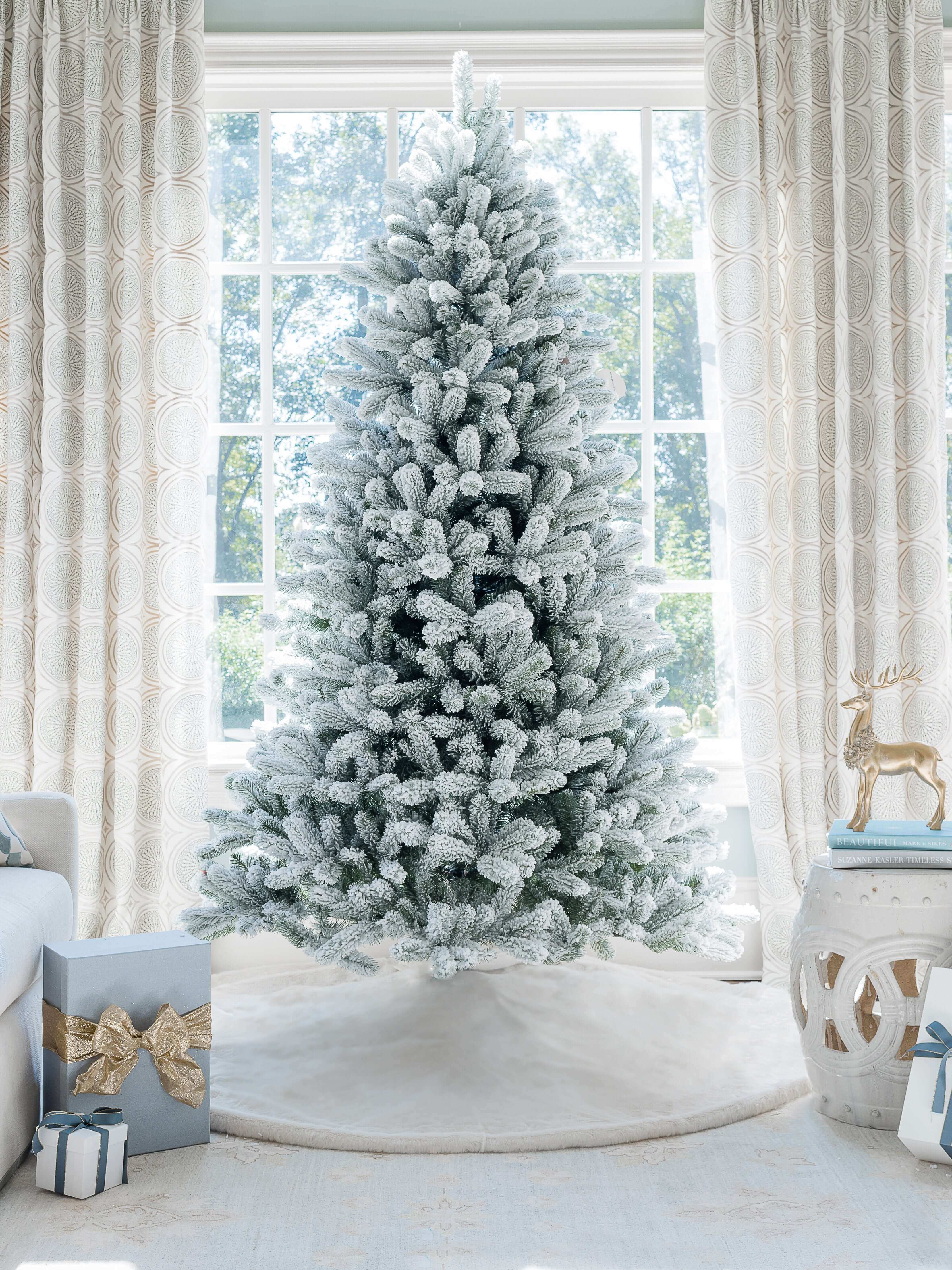 King of Christmas 9' King Flock® Artificial Christmas Tree with 1100 Warm White LED Lights