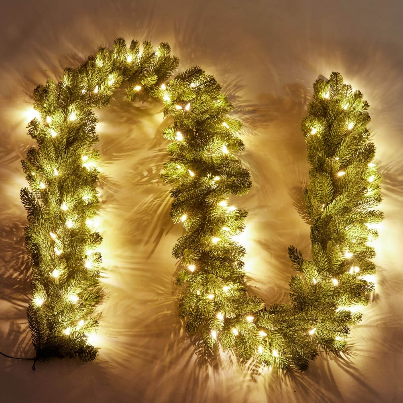 King of Christmas 9' x 10" Royal Fir Garland with Warm White LED Lights (Plug Operated)